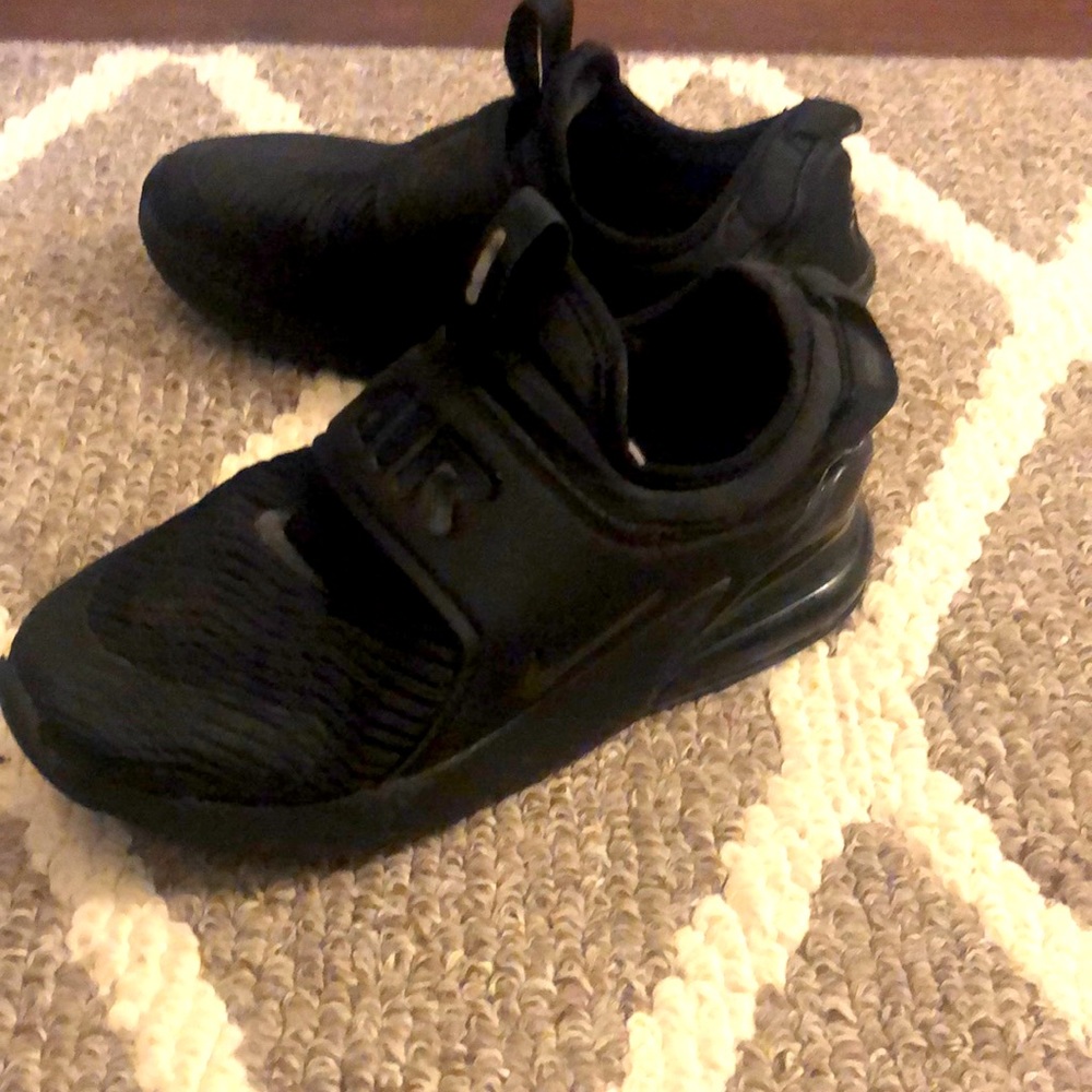 Nike boys shoes in a size 1 in black.